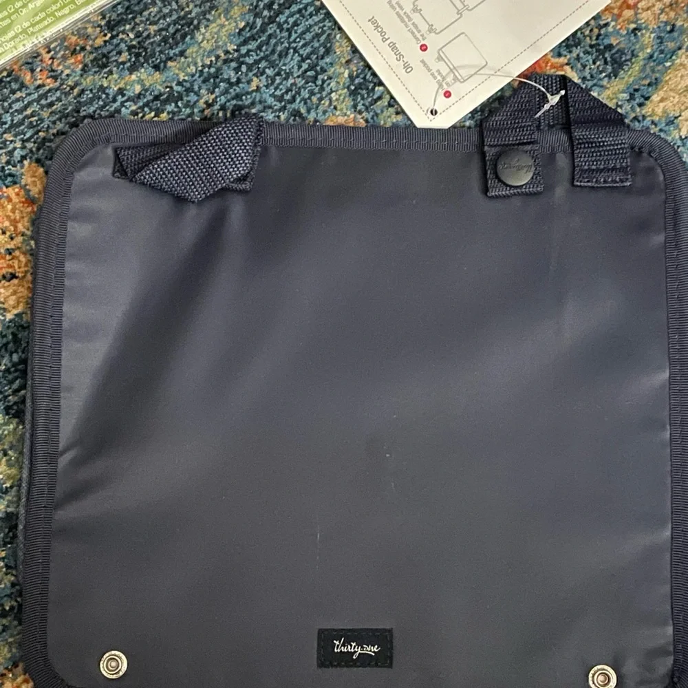 2 Thirty-One pocket organizers.